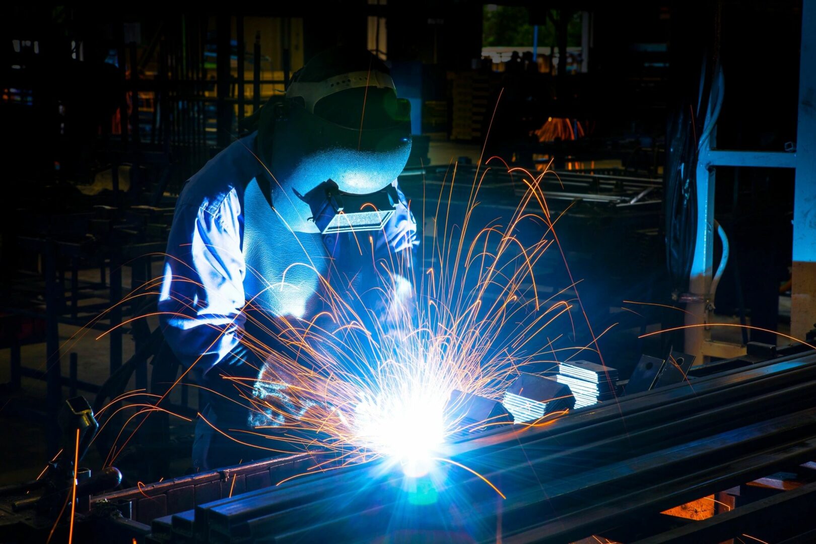 Welder working on metal fabrication