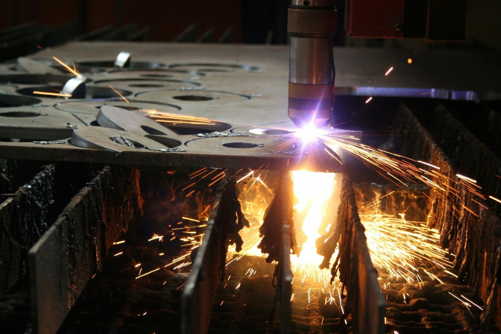 Industrial cutting machine on metal surface